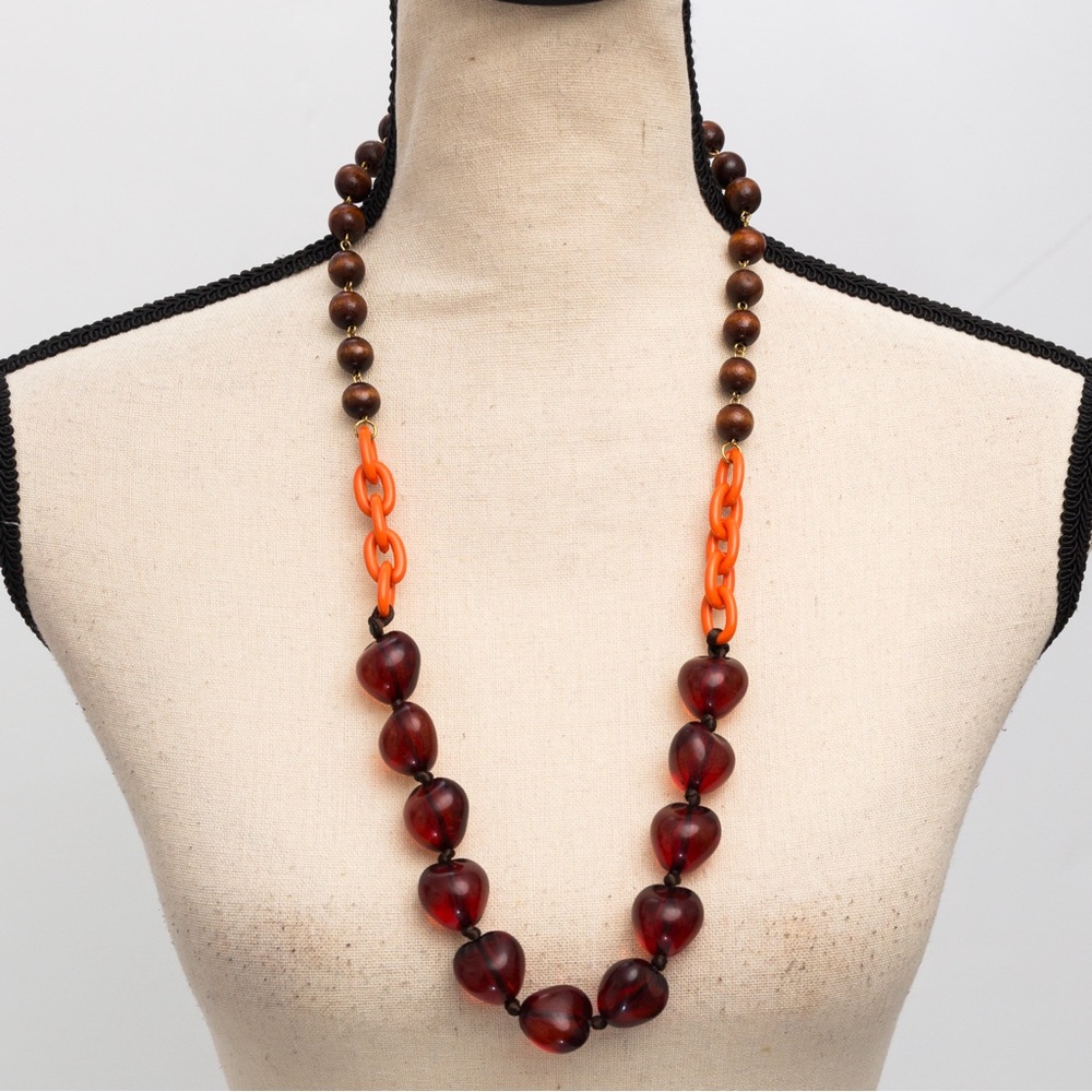 Unique longer length necklace with wood look beads, chain links, & rust beads